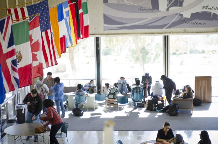 Students in a cafeteria socializing.